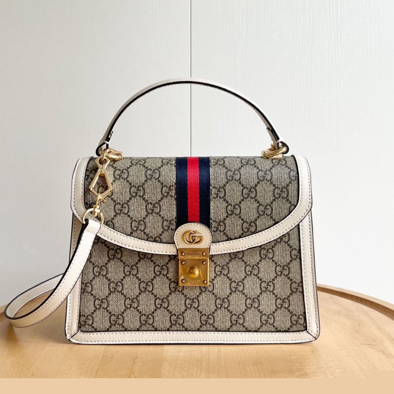 G*u*i top handle bags